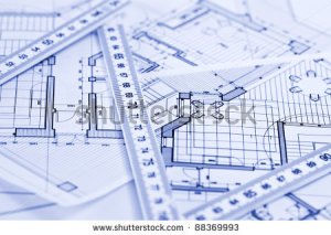 stock-photo-metric-folding-ruler-and-architectural-drawings-of-the-modern-house-88369993